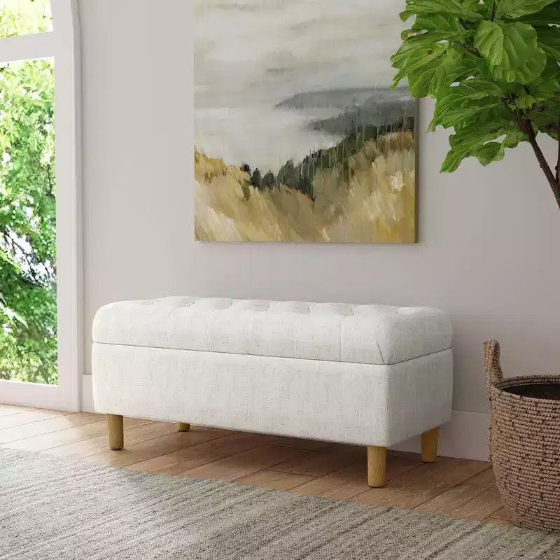 Banc de rangement capitonné avec pieds coniques en bois